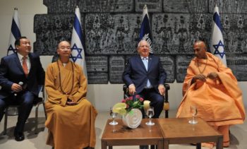 President Rivlin with Hindu and Buddhist monks from delegation of Asian Religious Leaders