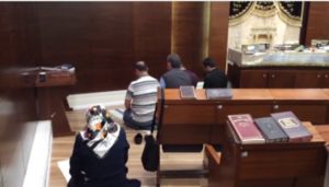Muslim tourists praying in Ben Gurion Airport synagogue